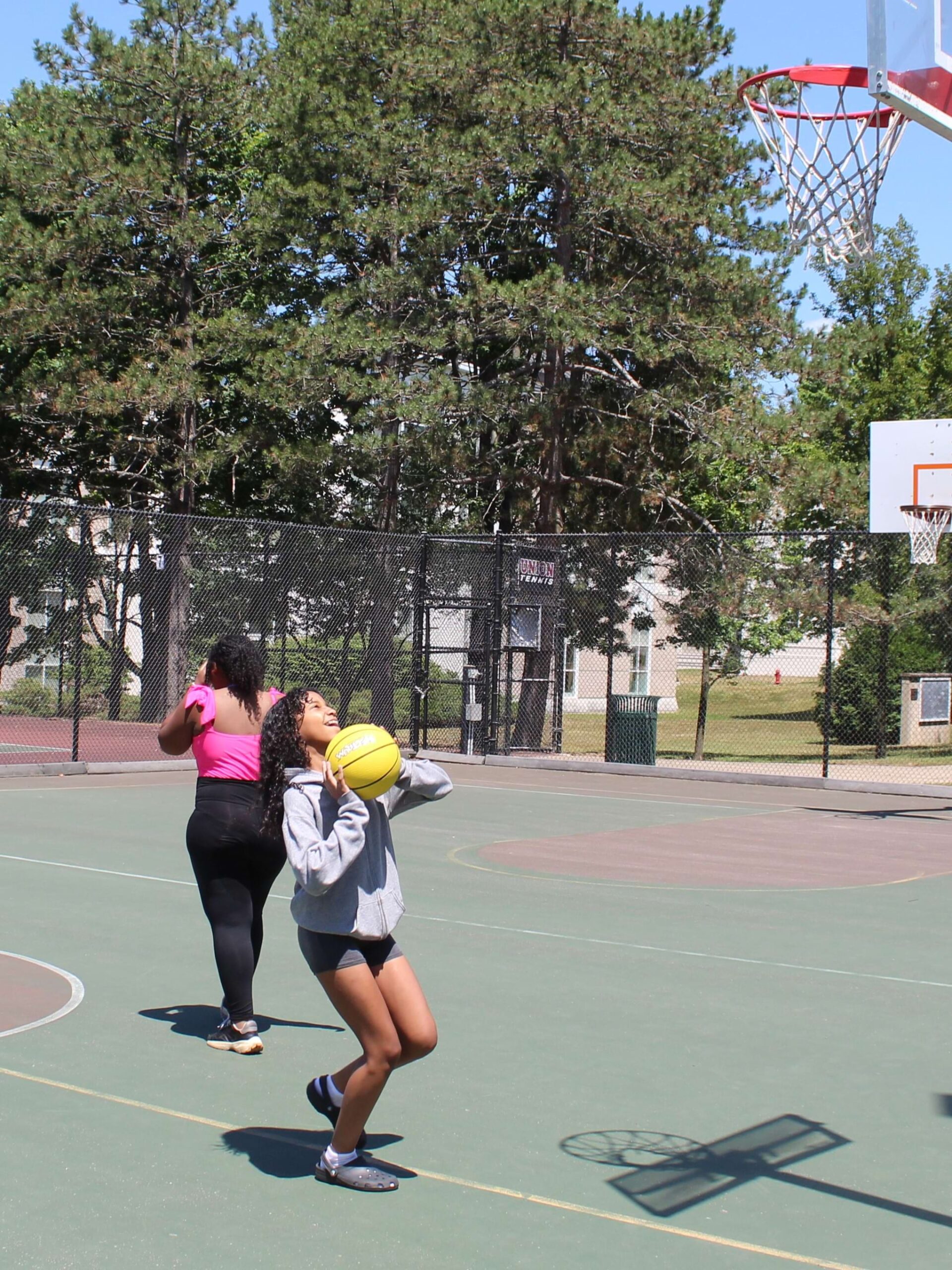 Girl preparing to shoot a basketball.